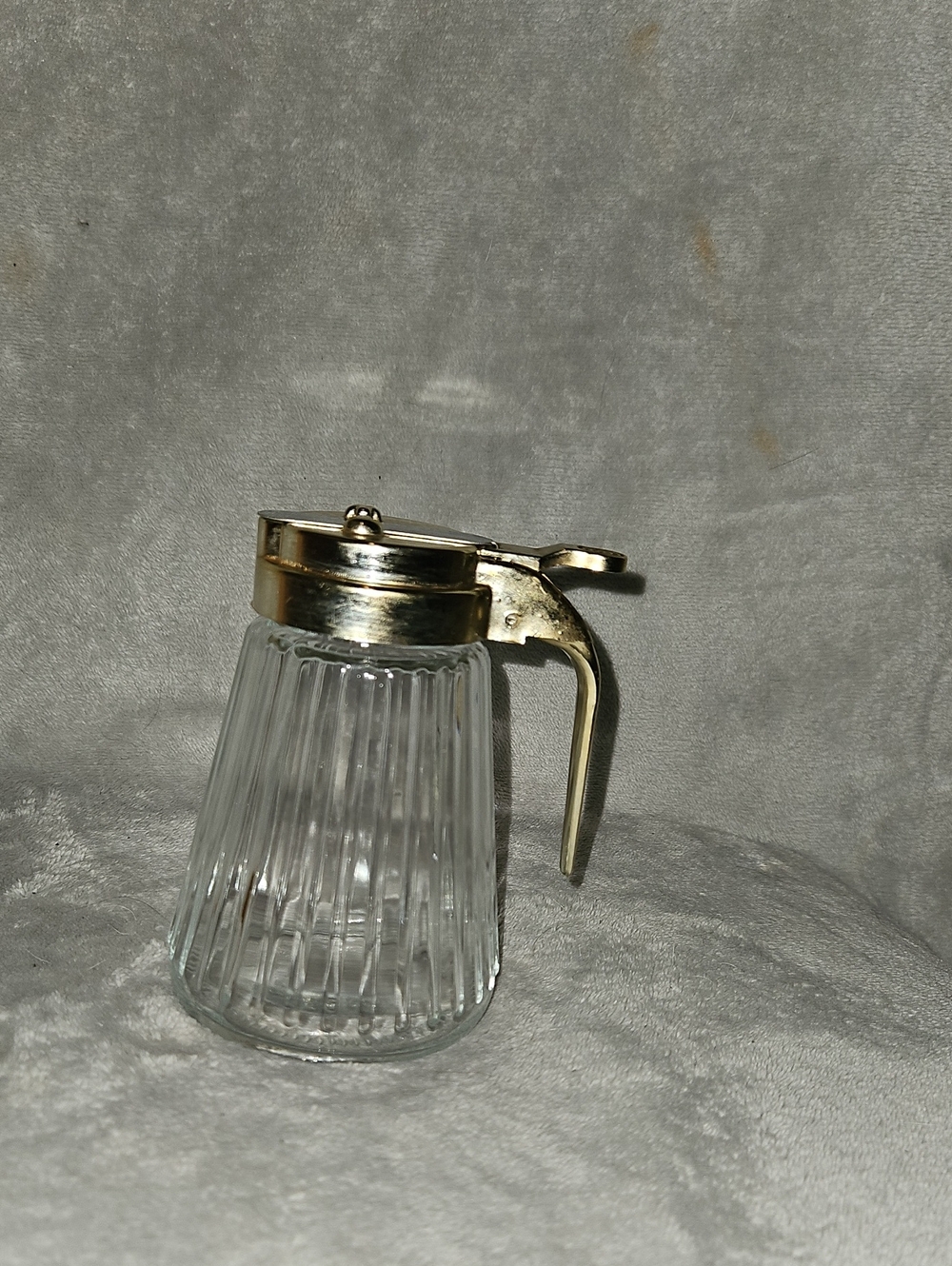 Clear Glass Syrup Dispenser with Gold-Tone Lid and Handle